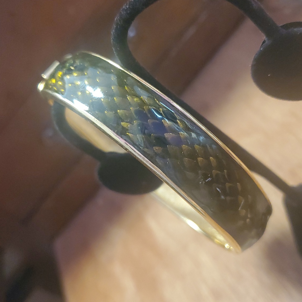 Joan Rivers snakeskin bracelet